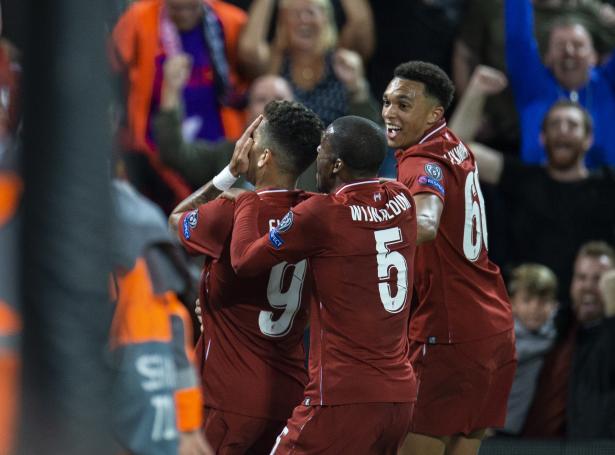 Liverpool vann 3-2 í einum sera góðum fótbóltsdysti á Anfield
(Mynd: EPA)