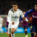 Varane hjá Real her í nærdysti við málskjúttan hjá Barca, Malcolm
(Mynd: EPA)