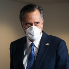 Mitt Romney luttók í mótmælisgongu í Washington