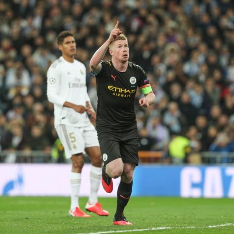 Kevin De Bruyne skoraði fyrra málið fyri City - Real Madrid vann eisini við tveimum málum (Mynd: EPA)