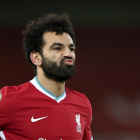 Mohammes Salah sendi Liverpool á sigurskós, men Wolves javnaði og var eisini nær við at avgerða tað (Savnsmynd: EPA)