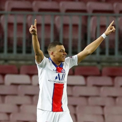 Kylian Mbappé gjørdi hattrikk á Camp Nou (Mynd: EPA)