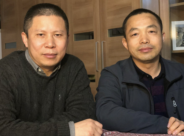 Xu Zhiyong og Ding Jiaxi (Mynd: Reuters)