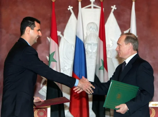 Bashar al-Assad, forseti í Sýria og Vladimir Putin, forseti í Russlandi í Moskva í 2005 (Mynd: EPA)