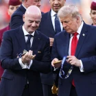 Gianni Infantino (t.v.) er við at kommercialisera fótbóltin eftir amerikanskari fyrimynd (Mynd: Justin Setterfield/AFP/Ritzau Scanpix)
